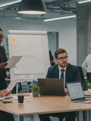 Diverse professionals discussing modern workplace cultural shifts