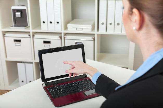 A close-up shot of a modern laptop screen displays a company's internal whistleblower policy document. The policy outlines the procedures for reporting concerns, the anonymity guarantees, and the protections against retaliation. The focus is on the clarity and accessibility of the information.