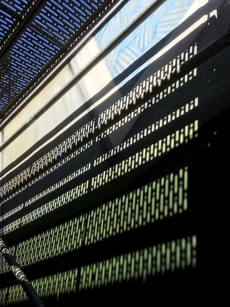 A high-resolution photograph of a computer screen displaying lines of encrypted code, symbolizing data security and the potential for digital leaks within US national security systems. Focus on the complexity of the code and the vulnerability it represents.